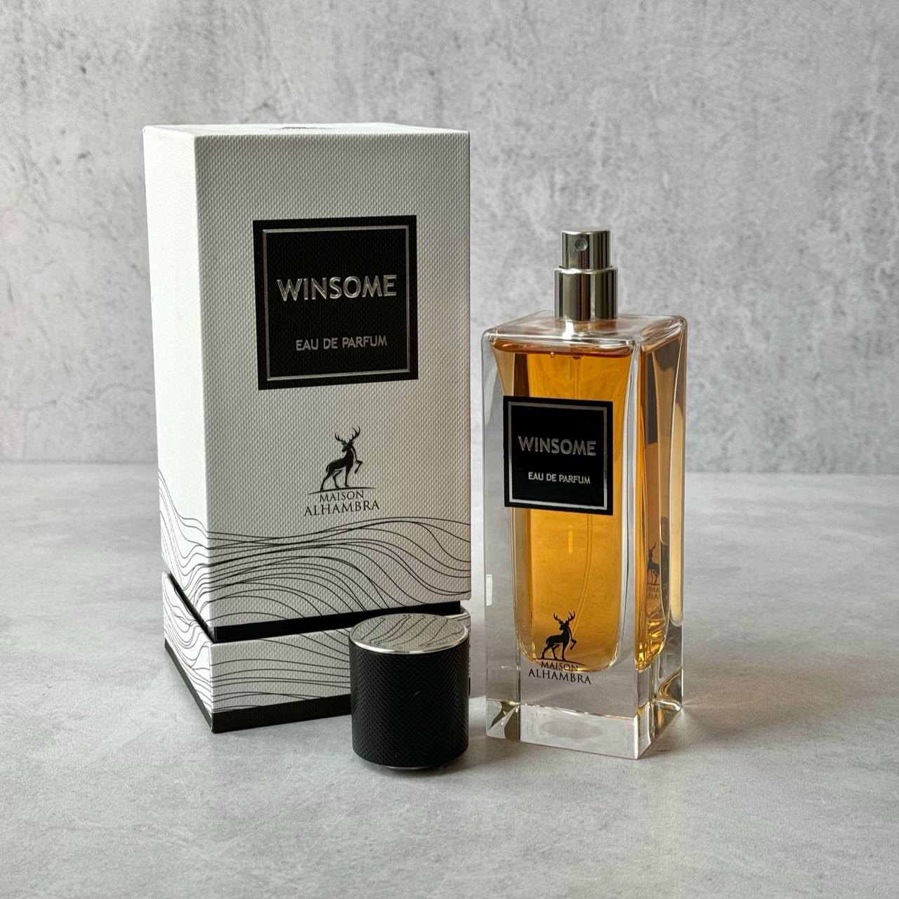 عطر ادکلن الحمبرا ایو سن لورن تاکسیدو